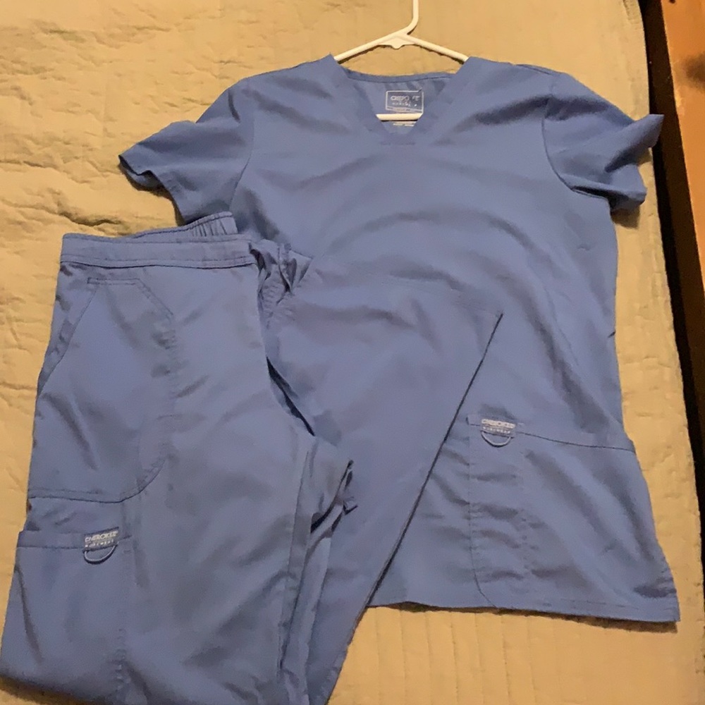 Women’s scrub set. top is a small and bottoms are a medium
